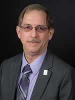 portrait of board member Kurt Gibbs