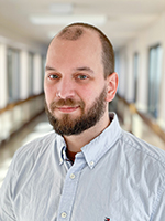 portrait of board member Joshua Geoffrey